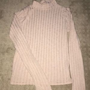 A light pink light half turtle neck blouse